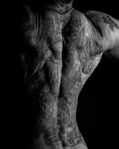 Tattooed Back Study Black and white bodyscape of a tattooed male back