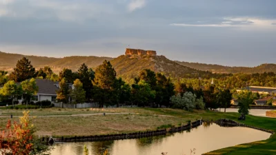 Castle Rock in Castle Rock, Colorado, seen from Plum Creek Golf Club. Castle Rock in Castle Rock, Colorado, photographed from Plum Creek Golf Club in warm evening light.
